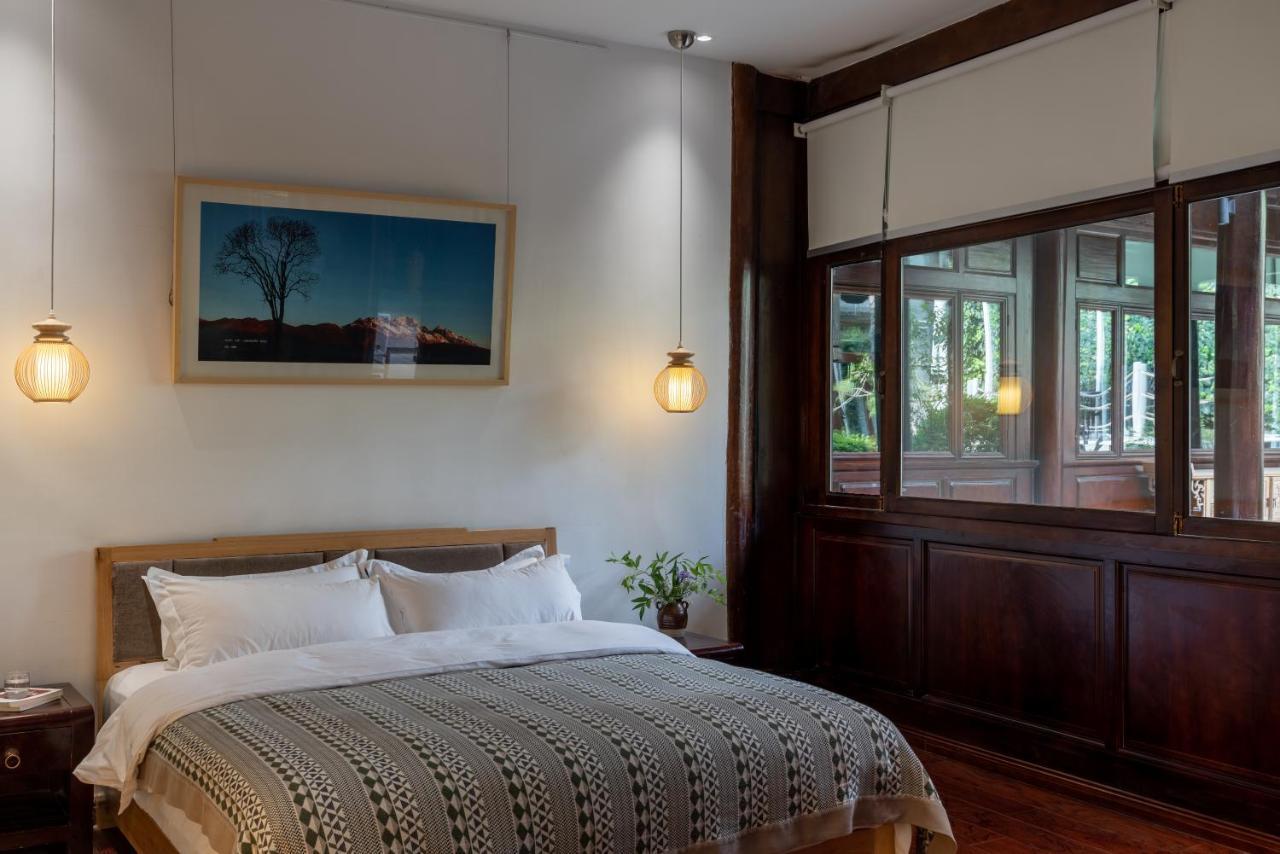 Jun Bo Xuan Boutique Hotel Лицзян Экстерьер фото