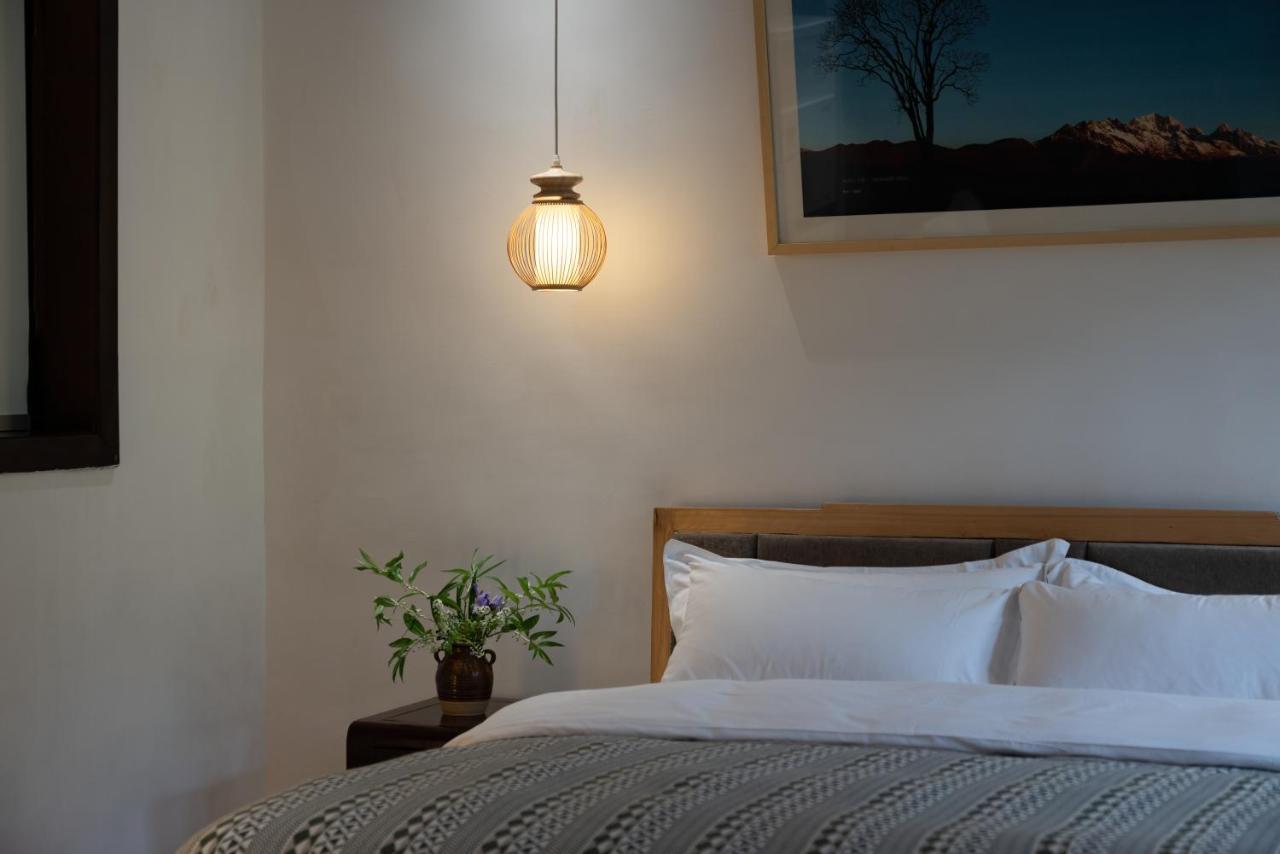 Jun Bo Xuan Boutique Hotel Лицзян Экстерьер фото