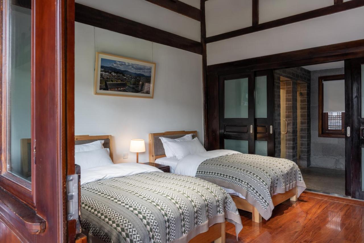 Jun Bo Xuan Boutique Hotel Лицзян Экстерьер фото