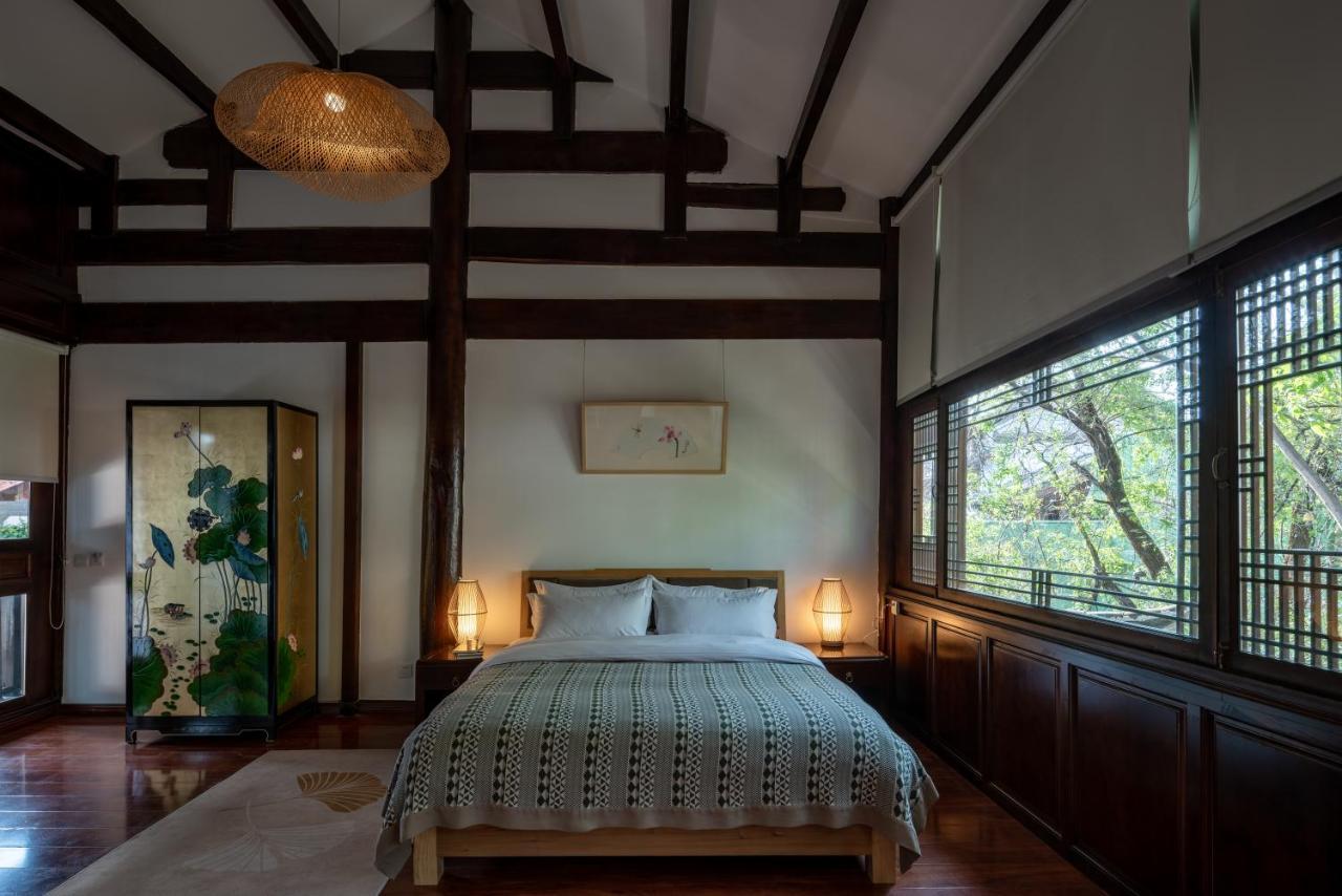 Jun Bo Xuan Boutique Hotel Лицзян Экстерьер фото