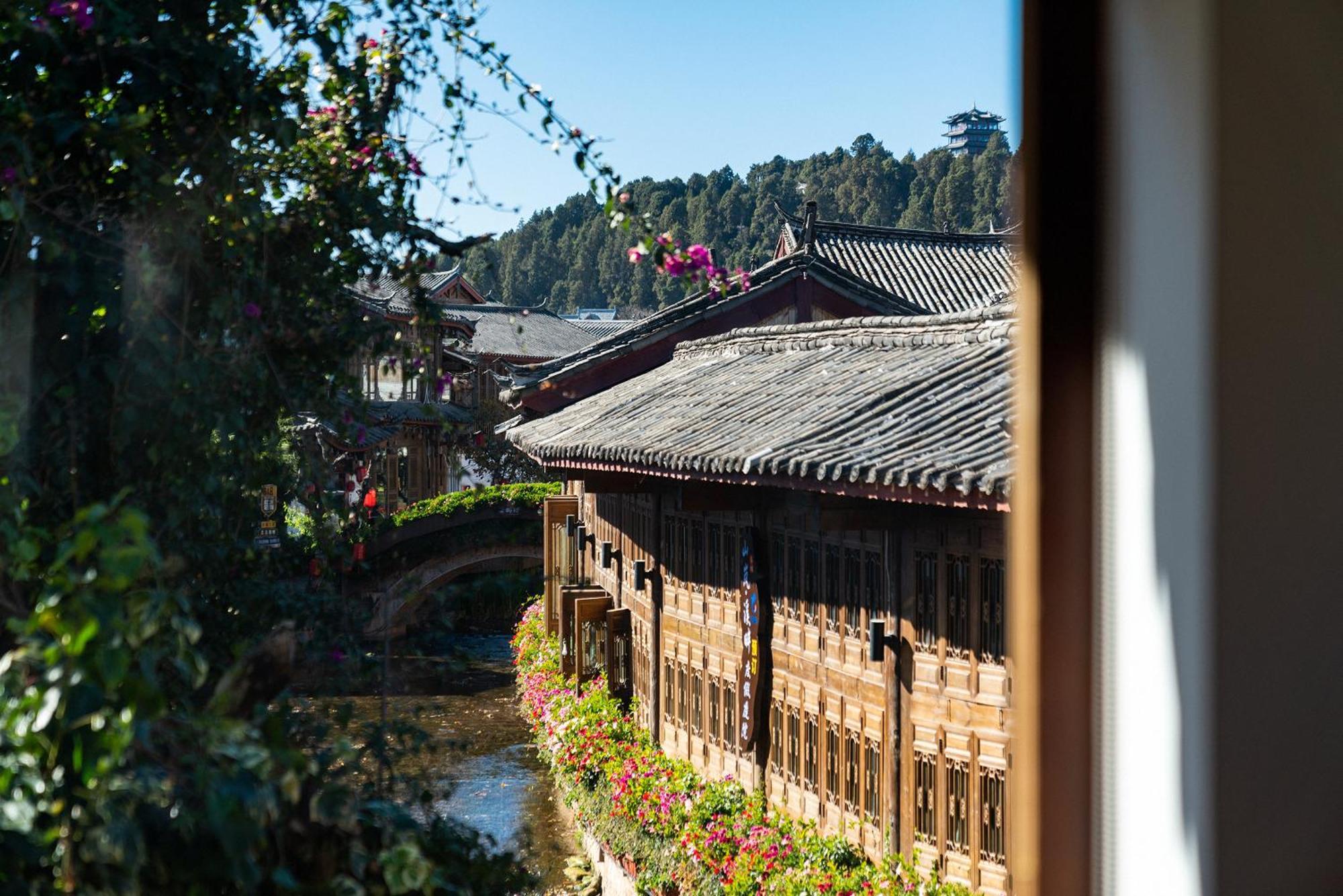 Jun Bo Xuan Boutique Hotel Лицзян Экстерьер фото