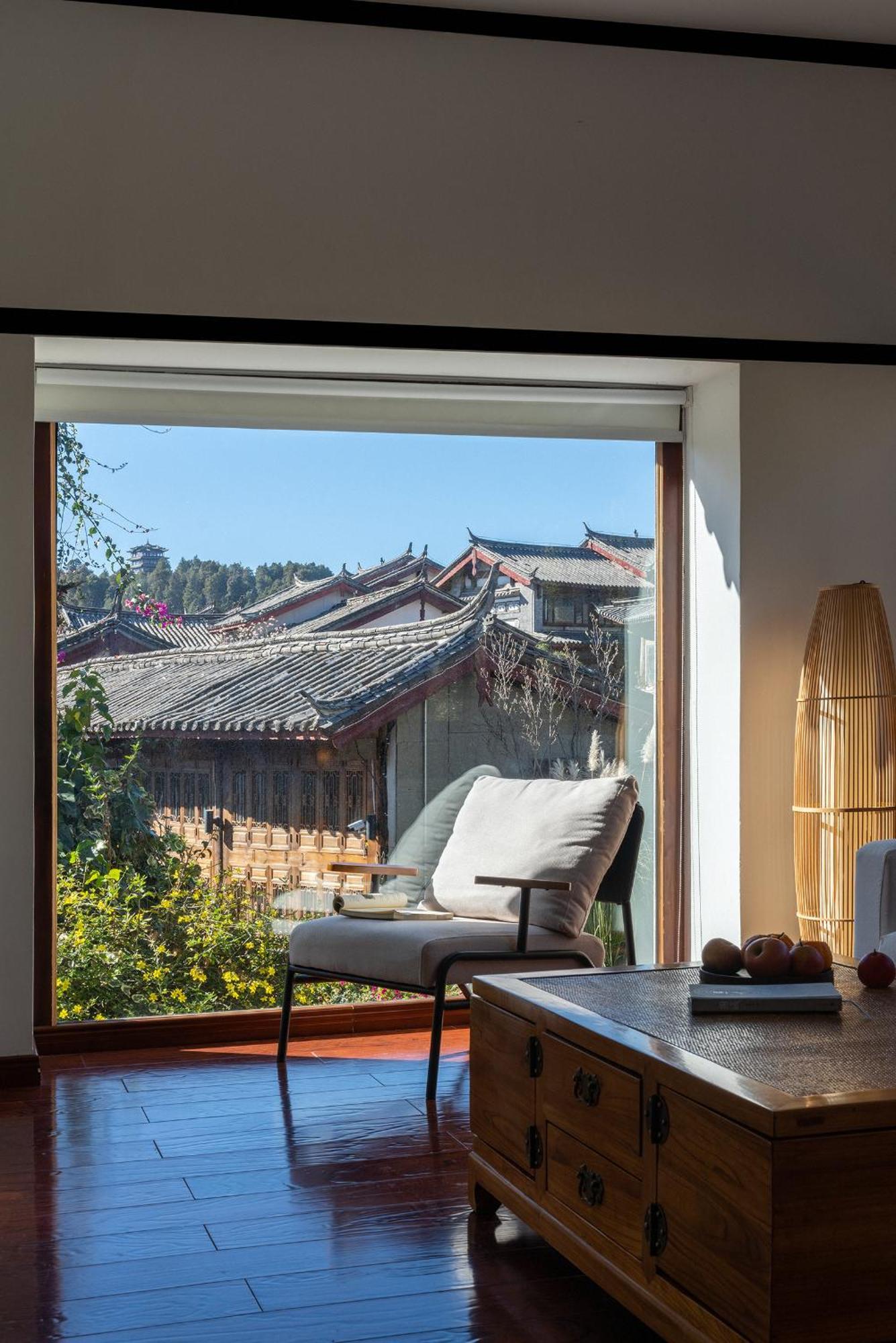 Jun Bo Xuan Boutique Hotel Лицзян Экстерьер фото