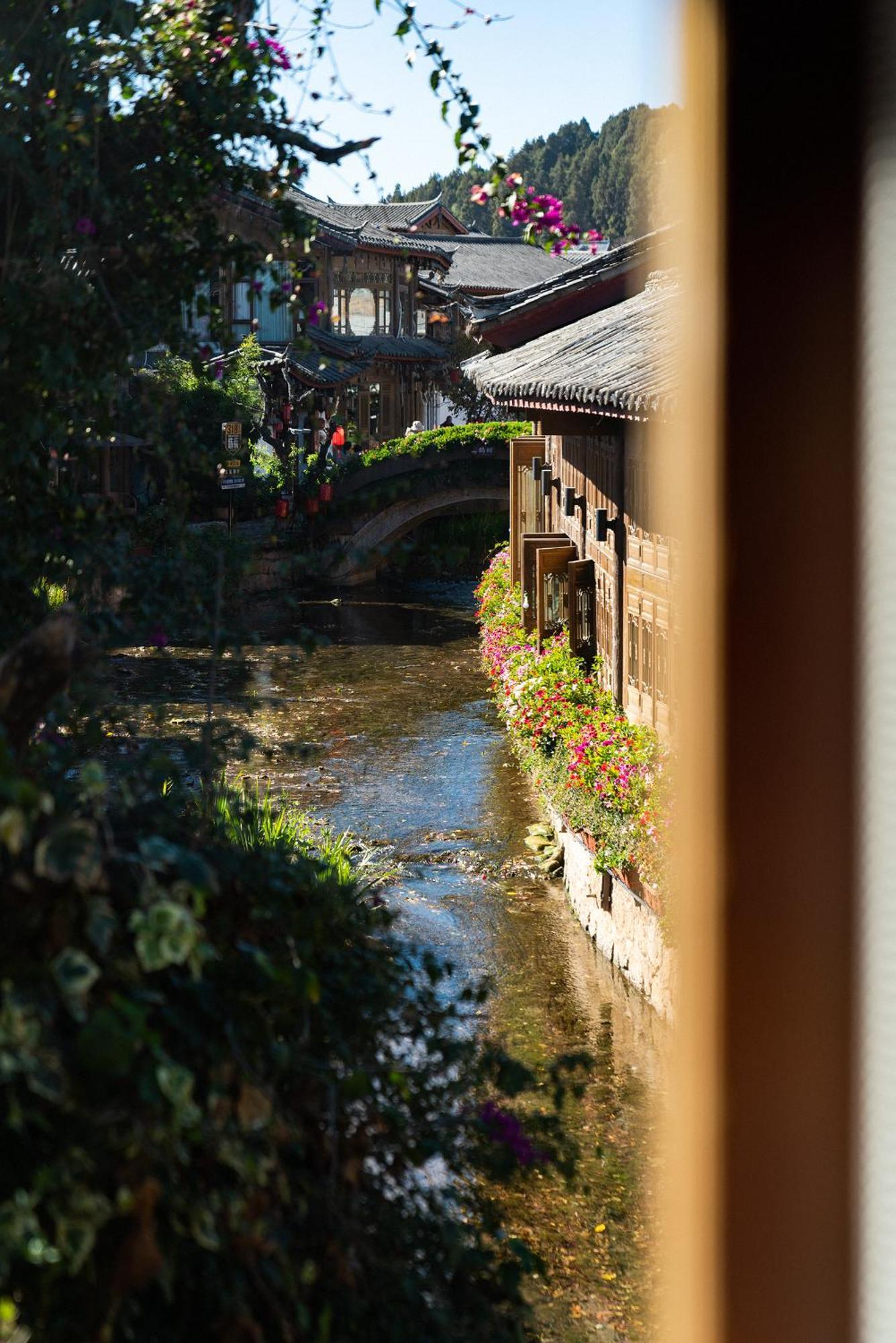 Jun Bo Xuan Boutique Hotel Лицзян Экстерьер фото