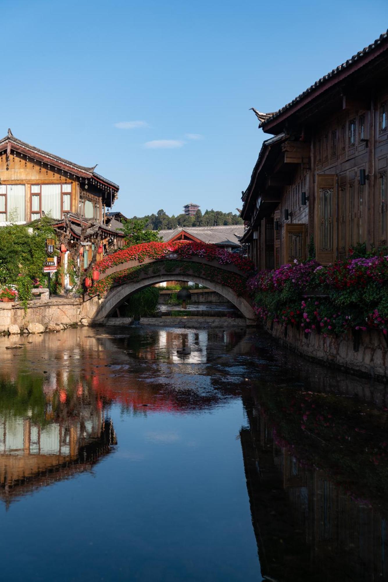 Jun Bo Xuan Boutique Hotel Лицзян Экстерьер фото