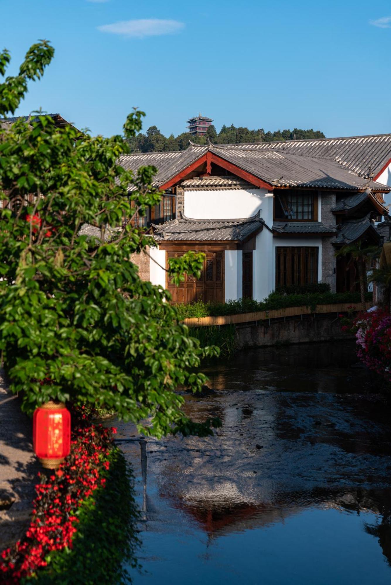 Jun Bo Xuan Boutique Hotel Лицзян Экстерьер фото