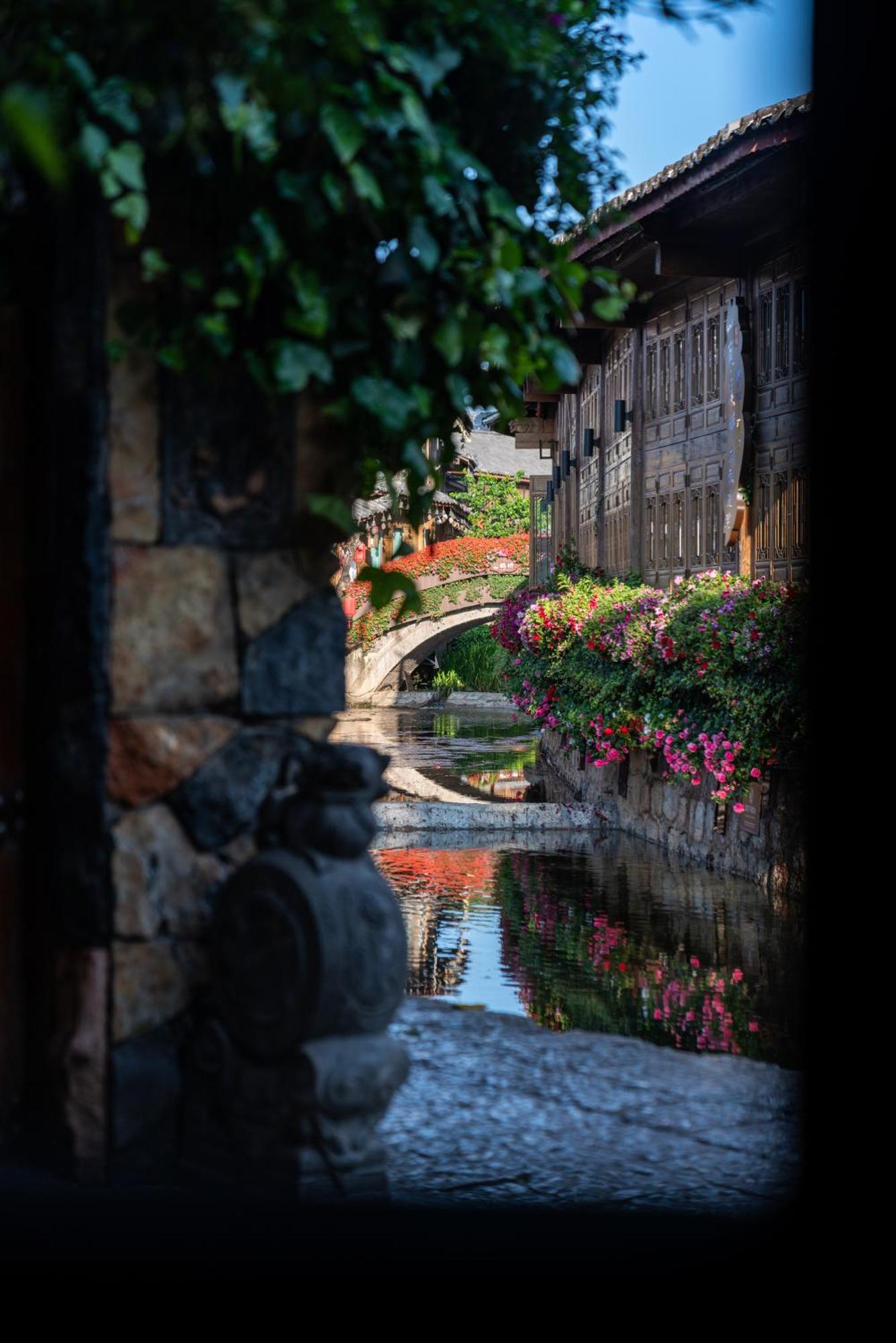 Jun Bo Xuan Boutique Hotel Лицзян Экстерьер фото