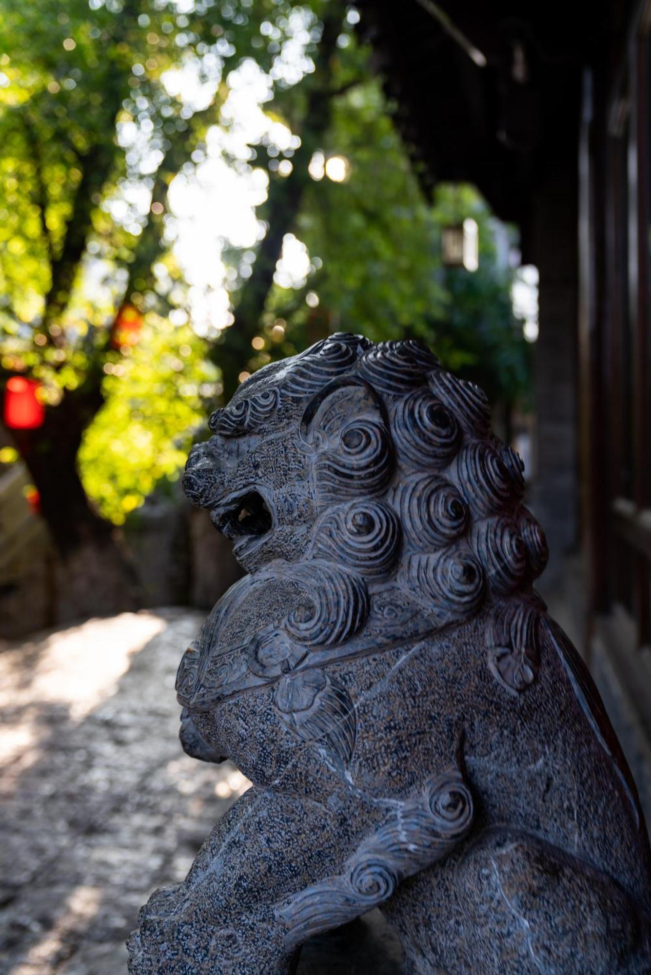 Jun Bo Xuan Boutique Hotel Лицзян Экстерьер фото
